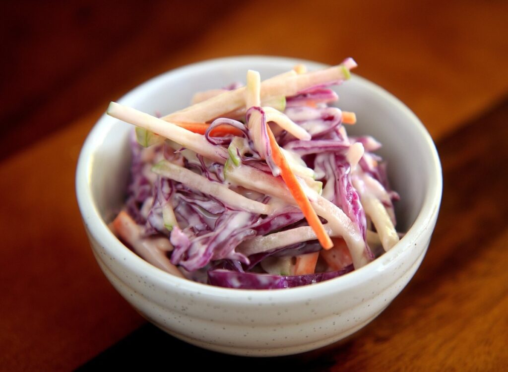 Coleslaw: a tasty side dish for humans but potentially dangerous for dogs.